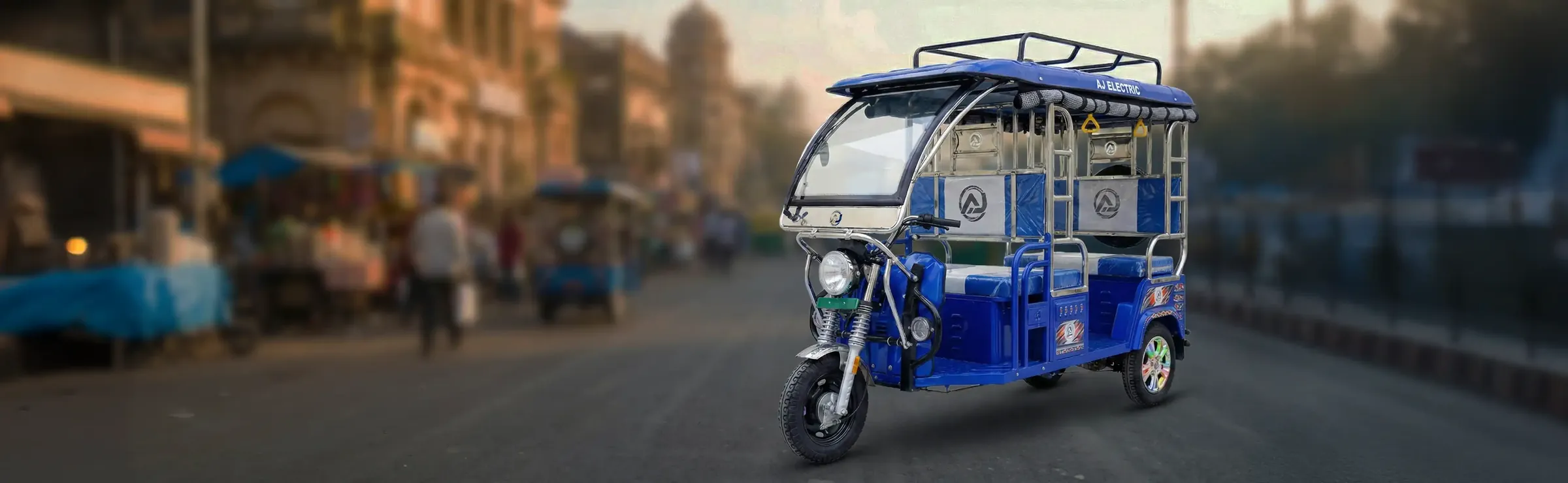 Blue Joy E-Rickshaw on a city street